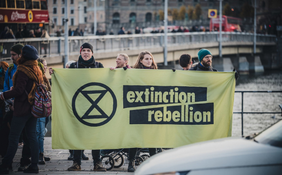Extinction Rebellion eco-activists protest near Barclays bank branches